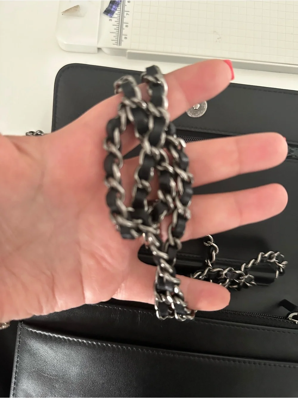 CHANEL Black Leather Clutch with Mixed Metal Chain Script